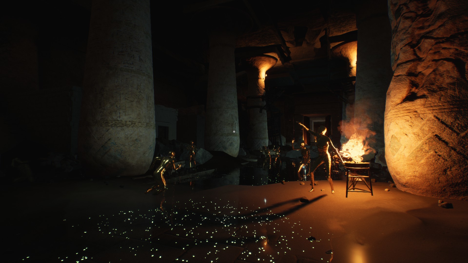{ Screenshot of a dark vast underground room with Egyptian columns, lit by firelight }